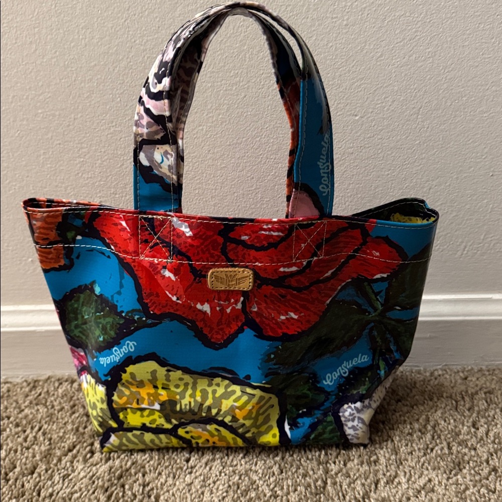 Consuela Grab 'n' Go Mini Legacy tote bag with a floral design.